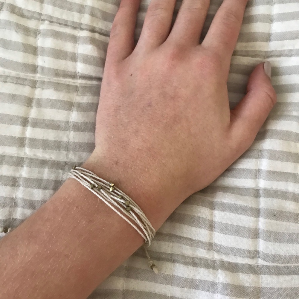 White Bracelet with Gold Beads